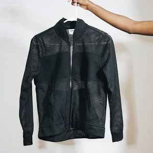 Black mesh cutout Reebok lightweight  jacket